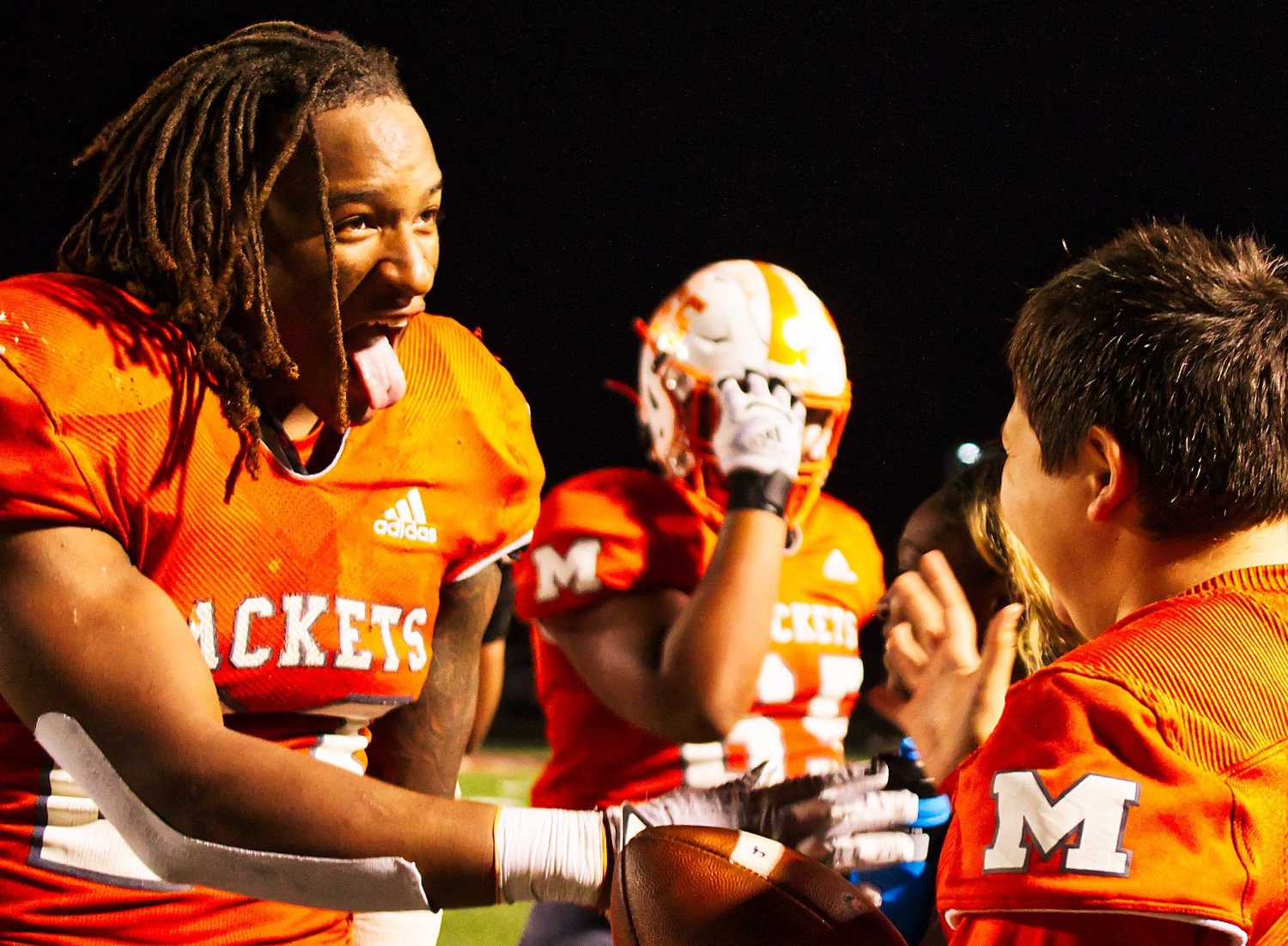 Trevion Sneed, having rung up 301 rushing yards on the night, shares his joy with a ball boy. With a secure lead in the fourth quarter, celebrations began early on the Mineola sidelines Friday night in Princeton.
[prints available of this photo, plus unpublished shots]